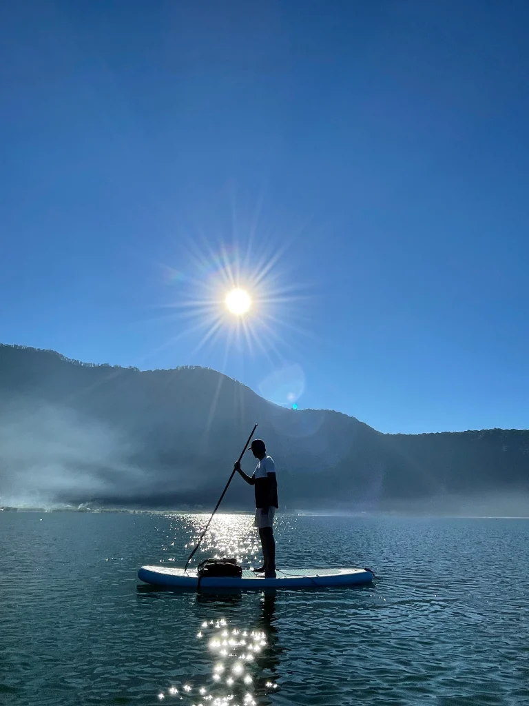 Stand up paddle on Lake Beratan at sunrise